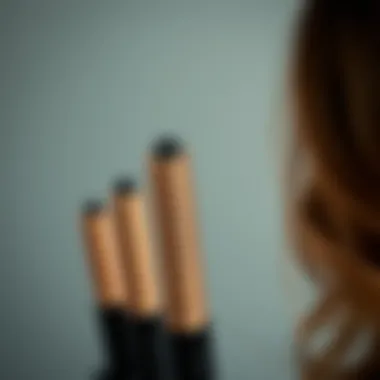 Detailed view of automatic hair wand barrel with various barrel sizes