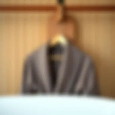 Elegant Wooden Bathrobe Hanger A stylish wooden bathrobe hanger displaying an elegant bathrobe