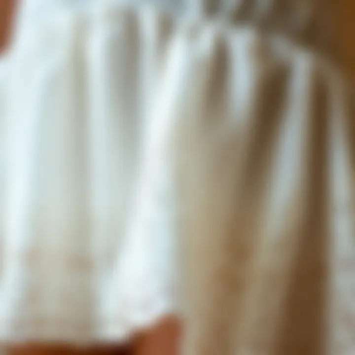 Close-up of delicate lace detailing on a white petticoat