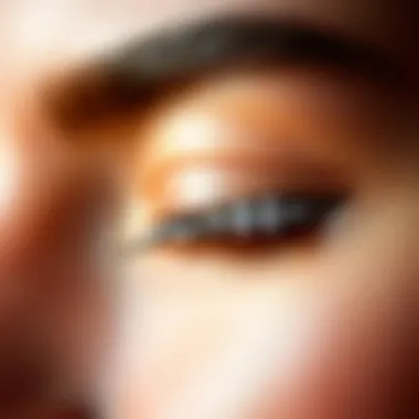 A stunning close-up of a diamond eyebrow ring showcasing its intricate design and sparkle.