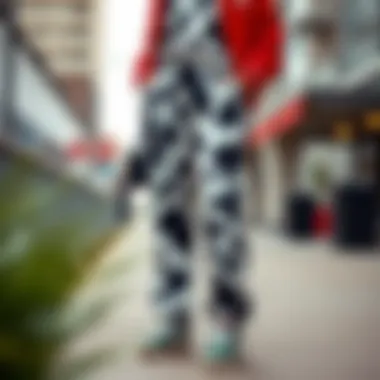Stylish cow print sweatpants showcased in a modern urban setting