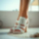 Elegant white sandals with intricate detailing