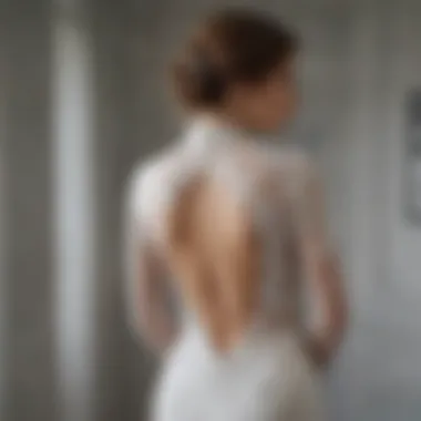 A bride showcasing the illusion back of the gown