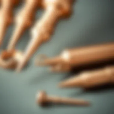 Close-up of rose gold ear stretching tools showcasing craftsmanship