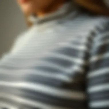 Textural Elegance: Fabric Choices for Comfort and Style Close-up of fabric texture of a striped turtleneck