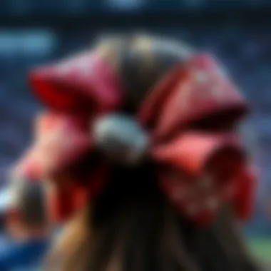 Close-up of a beautifully crafted football hair bow with intricate designs