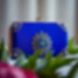 Elegant royal blue clutch with intricate design