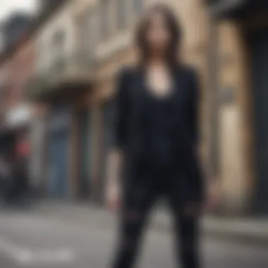 Chic Outfit with Black Ripped Jeans Chic outfit combining black ripped jeans and a stylish blazer