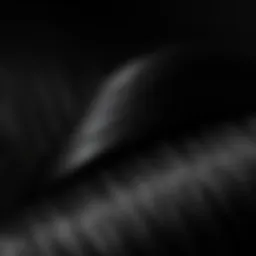 A close-up of luxurious black straight hair extensions showcasing shine and texture