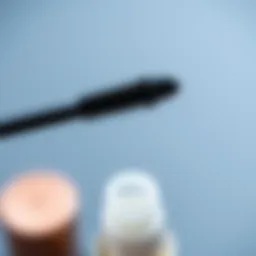 Mini mascara wand showcasing its sleek design and bristles