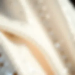 Elegant close-up of white sequins fabric reflecting light