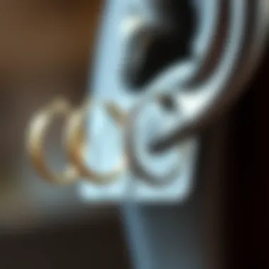 Care instructions and maintenance tips for 14 gauge earrings displayed creatively