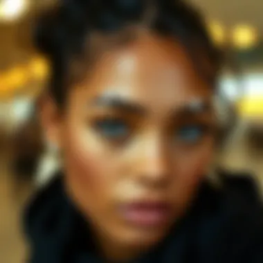 A fashionable individual displaying various styles of diamond eyebrow rings.