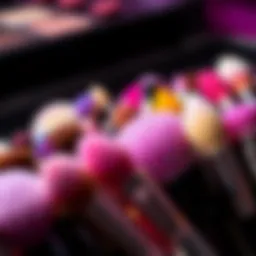 An array of glitter makeup brushes displaying a spectrum of colors