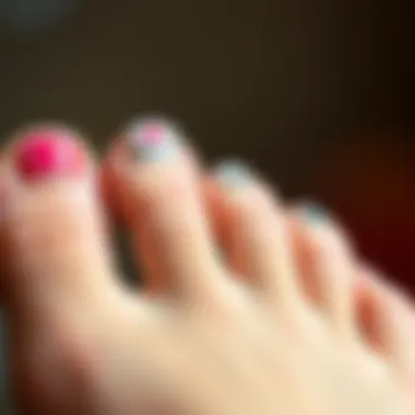 Close-up of applied toenail stickers on toenails