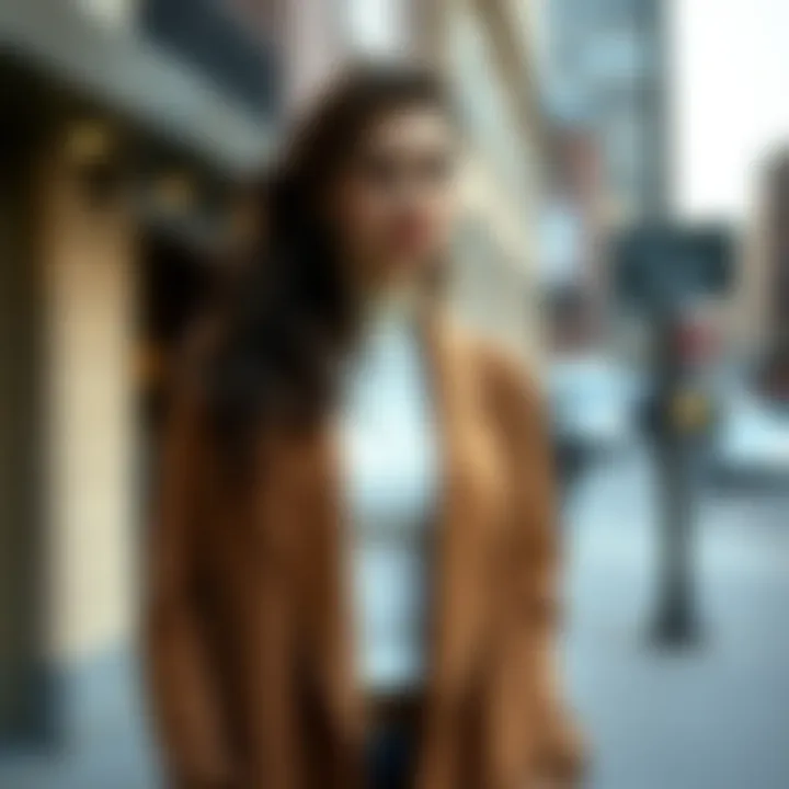 A model elegantly styled in a brown duster cardigan against a chic urban backdrop.