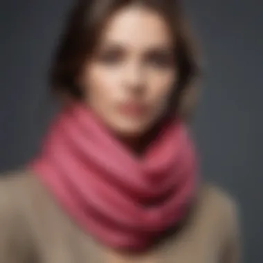 A collection of solid color neck scarves in various hues arranged aesthetically