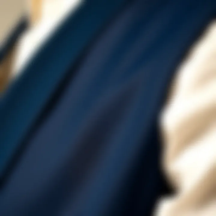 Close-up of textured fabric of a navy blue suit vest