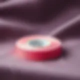 Close-up of adhesive hem tape roll on fabric