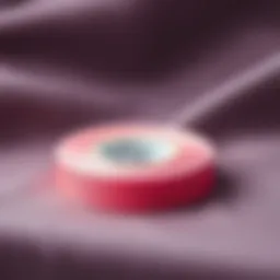 Close-up of adhesive hem tape roll on fabric