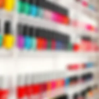 A close-up of acrylic shelves with nail polish arranged by color