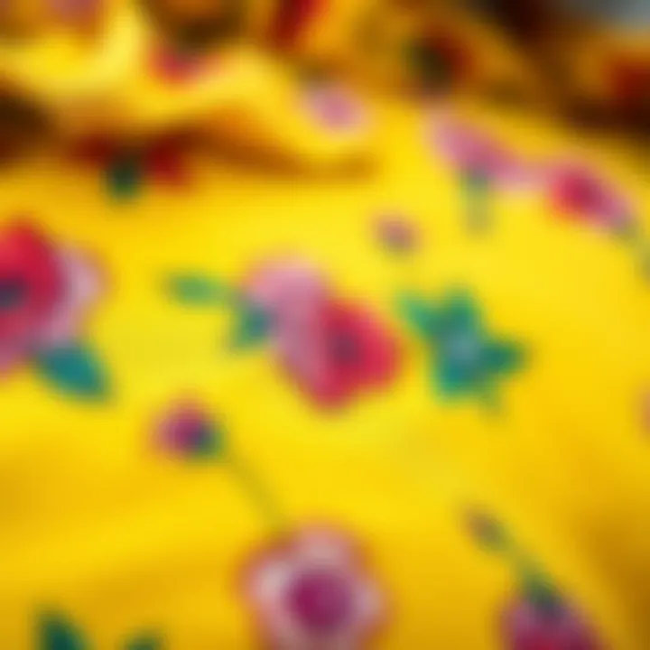 Close-up of floral patterns on yellow fabric
